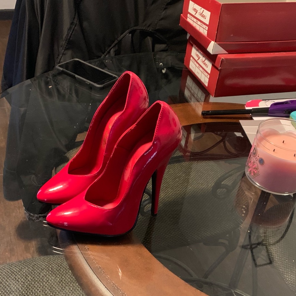 Red patent stiletto pumps